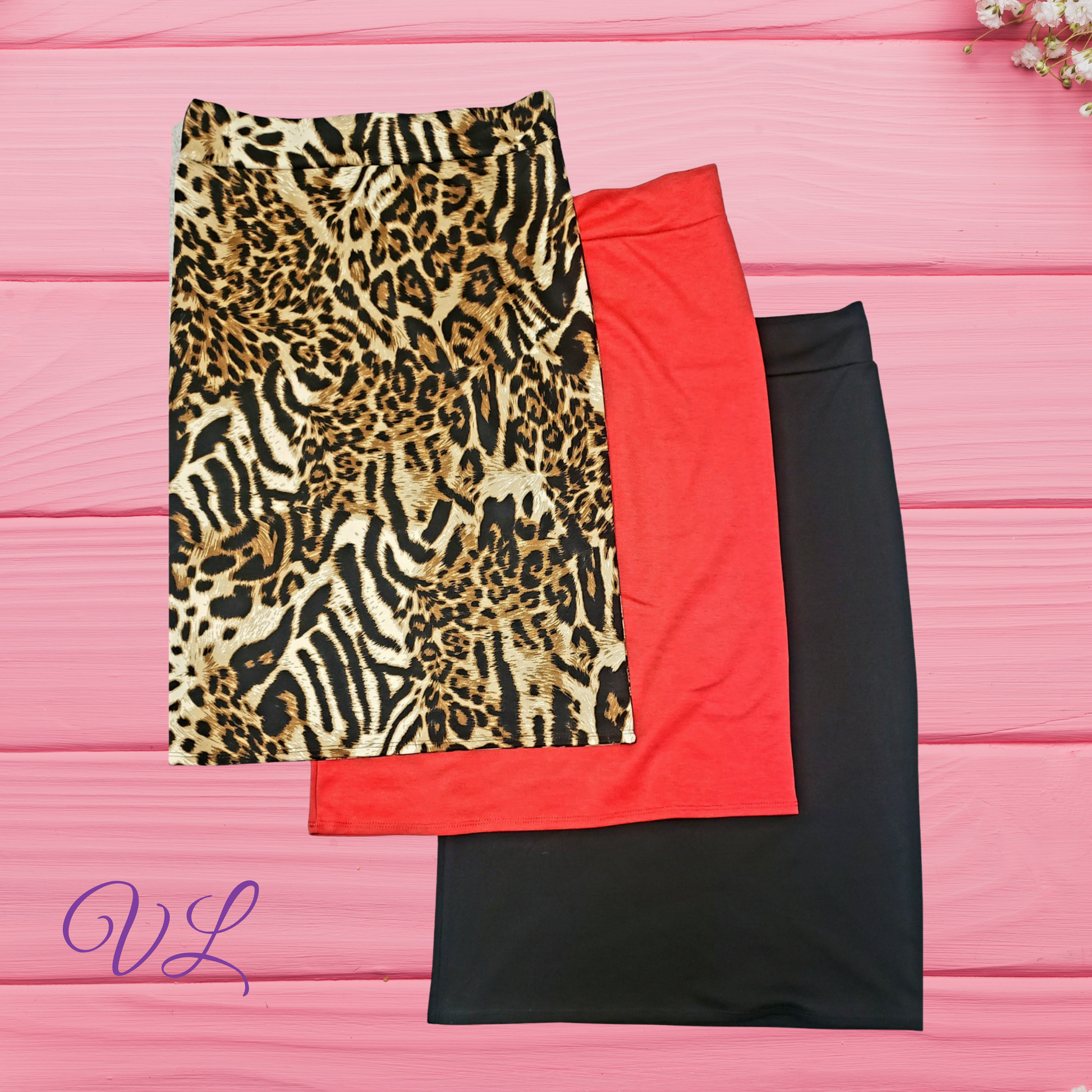 The Abby is a high waisted pencil skirt that is a must have for every wardrobe.  This fitted midi skirt has an elastic waistband with lots of stretch.  The material is breathable and length hits right below the knees.  Made in the U.S.A. of 89% polyester 9% rayon, and 2% spandex.  The Abby skirts runs true to size and looks great on all body types you can't go wrong.   Available in three colors black, red, and leopard brown print.