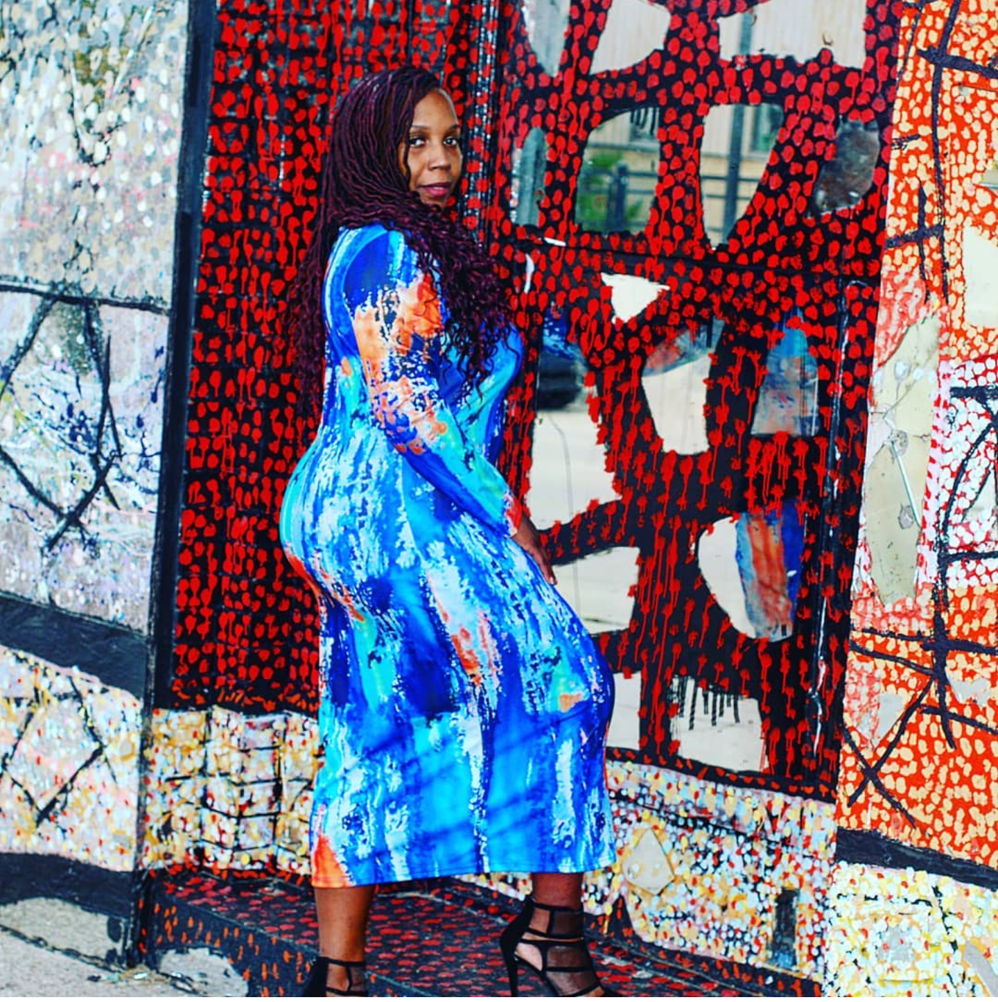 The Annie is a multi colored blue bodycon dress with long sleeves. The perfect dress to slip on and be ready for whatever the day brings.  Made in China of 35% cotton and 65% polyester.  The Annie dress runs a little snug but hugs all the right curves.  Be ready to turn heads without even trying.