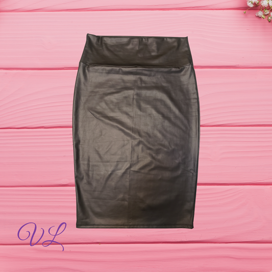 The Angel skirt is a black faux leather high waisted pencil skirt that gives just enough jazz to any outfit.  Made with materials in the U.S.A. This skirt comes down just below the knees and has plenty of stretch to hug over all your curves perfectly.   The skirt runs true to size.  The Angel will look great on all body types.