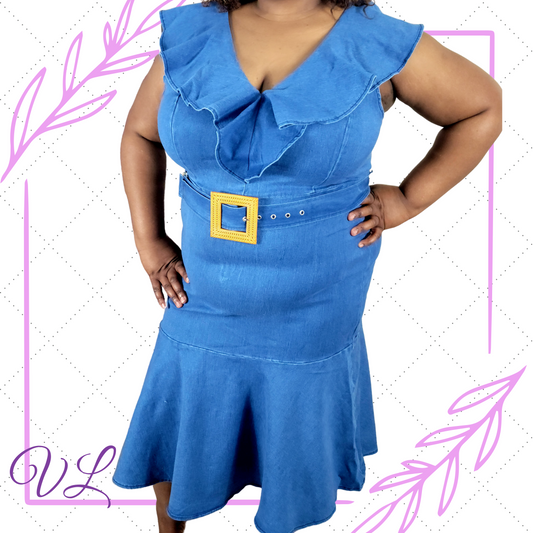 The Denim Annalise Dress is the ready to go dress for just about any occations. Be ready in this ruffled collar dress that also has a flair mermaid ruffle at the knees. Coming with a wide belt that has wood tone going through it, the dress has a gold zipper down the back.  Made in China of 75% cotton, 23% polyester, ans 2% spandex the Annalise dress has plenty of streach